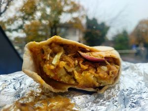 Aloo Tikki Wrap with Chickpeas at Deluxe Snacks in Rugby