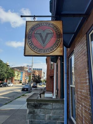 Street sign at The Vegetable Hunter Cafe and Boutique Brewery in Harrisburg