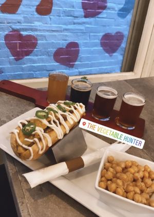 Cheesesteak, chickpea salad & beer flight, so yum!   at The Vegetable Hunter Cafe and Boutique Brewery in Harrisburg