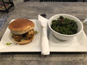 Ranch and Bacon Chicken Sandwich with a side Kale Salad  at The Vegetable Hunter Cafe and Boutique Brewery in Harrisburg