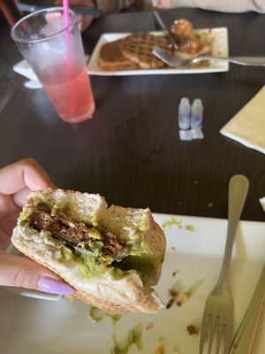 sausage breakfast bagel & chicken and waffles. the bagel sandwich was pretty dry    at The Vegetable Hunter Cafe and Boutique Brewery in Harrisburg