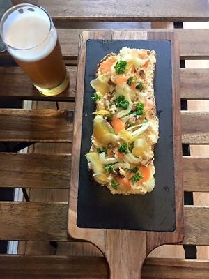 Roasted Root Vegetable Hummus Tartine  at The Vegetable Hunter Cafe and Boutique Brewery in Harrisburg