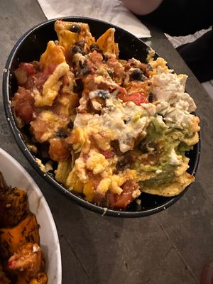 Loaded nachos has the most amazing cheese sauce! at The Vegetable Hunter Cafe and Boutique Brewery in Harrisburg