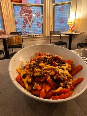 Loaded sweet potato fries were yummy!! at The Vegetable Hunter Cafe and Boutique Brewery in Harrisburg