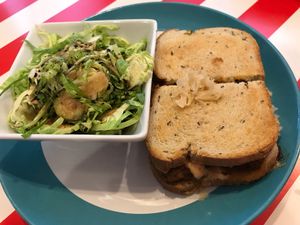 Tempeh Ruben and Brussel Sprout side at The Vegetable Hunter Cafe and Boutique Brewery in Harrisburg