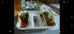 Al pastor taco and chipotle potato taco. Side of Green rice at El Borracho - Pike Place Market in Seattle