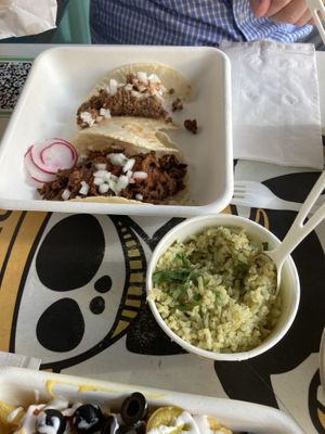 Green rice and two types of tacos  at El Borracho - Pike Place Market in Seattle