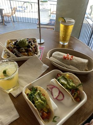 Fully loaded nachos, shrimp burrito, tofu tacos  at El Borracho - Pike Place Market in Seattle