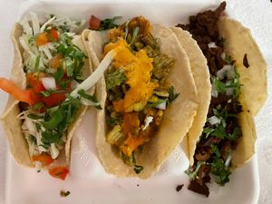 Left to right: shrymo tajín taco, spicy chipotle potato taco, barbacoa taco  at El Borracho - Pike Place Market in Seattle