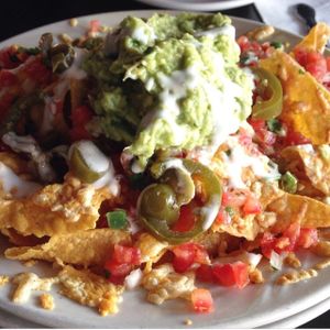 Literally heaven on a plate—the best nachos I've ever tasted at El Borracho - Pike Place Market in Seattle