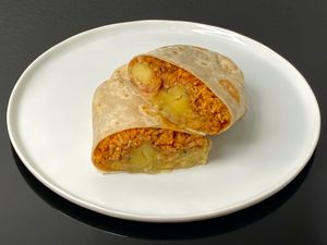 papas y poblanos burrito (cut in half + plated at home) at El Borracho - Pike Place Market in Seattle