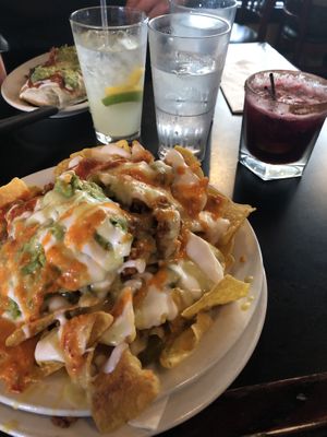 Vegan nachos, hibiscus margarita, and a vegan burrito at El Borracho - Pike Place Market in Seattle