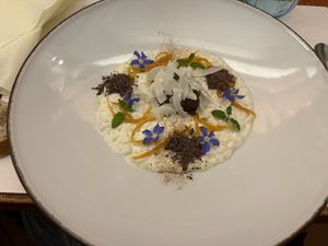 Rice cream with chocolate ice cream
with coconut flakes and orange zest  at MADREPERLA Bistrot in Friuli-venezia Giulia