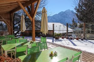 Sunny terrasse at Katharinas Veganer Naturgasthof in Lienz