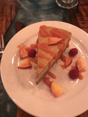 Seasonal cashew cheesecake - nectarine. I thought nectarine was weird but then I took a bite. Breath takingly delicious. at Sanctuary Bistro in Charlotte