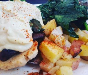 Biscuit with spinach and mushrooms topped with hollandaise sauce.  at Sanctuary Bistro in Charlotte