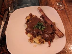 Lions mane roast slices at Sanctuary Bistro in Charlotte