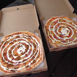 vegan chicken and vegan kebab pizza at Pizzeria Milano in Jonkoping