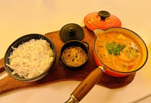Moqueca. Hearts of palm and banana in coconut milk, coconut rice and passion fruit farofa. at Zaza Bistro Tropical in Rio De Janeiro