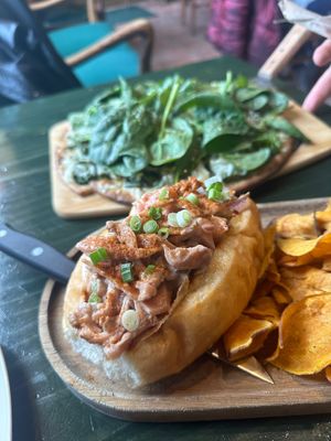 Hearts of Palm & Lion's Mane "Lobster" Roll with sweet potato chips at House of Bogini in Lake Geneva