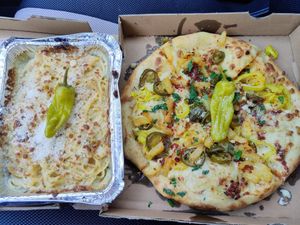 Baked alfredo pasta and zesty jalapeno and pineapple pizza at Love Amaro Pizzeria in Fontana