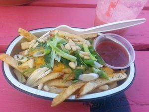 Freshly made vegan poutine and melonade. at The Mighty Melon - Food Truck in Sicamous