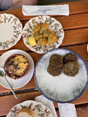 stuffed zucchini flowers, Cretan-style fava, and herb fritters   at Gürkan'ın Yeri in Ayvalık