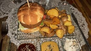Burger with wedges and bbq, mustard and maio at Moon in Siracusa