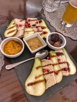  Homemade cheese plate with olives, pears and marmelades at Moon in Siracusa