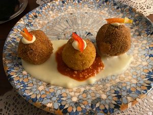 Tris di arancini  at Moon in Siracusa