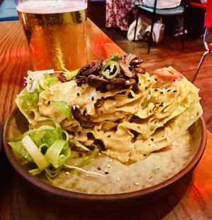 Tiger wedge salad with roasted shiitake mushroom and whipped sesame dressing.   at TANGRA in London