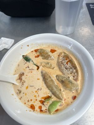 Just coconut milk. Zero spice, acidity, salt, sweetness, nothing   at Vegan mama in Chiang Mai