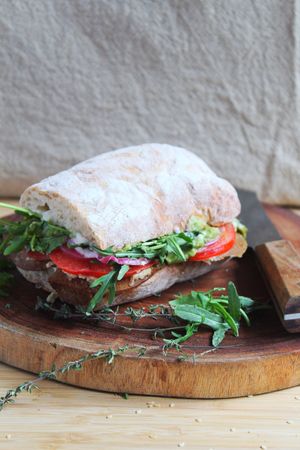 Green & Tangy 
Plant-based pastrami, avocado mousse, tomato, cashew cheese, aioli, dijon mustard, pickled red onions & rocket on a ciabatta.
  at The Roots in Queenstown