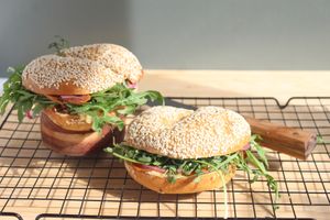 Smoked Root Bagel
Carrot lox, cashew cheese, pickled red onions, capers, rocket, fresh dill & tofu–sauerkraut sauce on a sesame bagel.

  at The Roots in Queenstown
