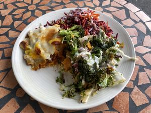 Vegan lasagna, sweet potato salad and beetroot and carrot salad with tahini dressing   at Radhey Chai Bar in Fitzroy