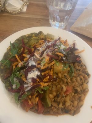 Rice, black eye bean curry, Thai green curry, choice of salad & tahini sauce.  Yum!   at Radhey Chai Bar in Fitzroy