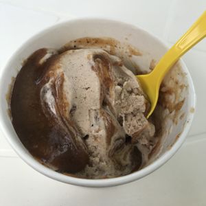 Non-dairy Cinnamon hard-serve with vegan caramel sauce (partially eaten because I couldn't wait to take a photo!) at Ice Cream Cafe in Orleans