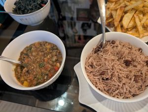 Lentil stew and Jamaican spiced rice at The Vegan & Jamaican Restaurant in Nairobi County