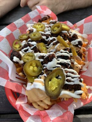 Loaded burnt end fries at Atlas Meat-Free Delicatessen in Miami