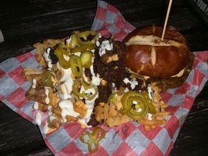 Korean Patty melt with loaded bbq fries at Atlas Meat-Free Delicatessen in Miami