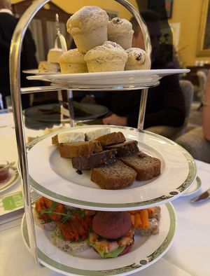 Tray of vegan scones, cakes, and finger sandwiches.  at Drawing Rooms at Merrion Hotel in Dublin