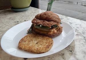 Breakfast Sausage Croissant Sandwich  at The Dusted Cup in Portland