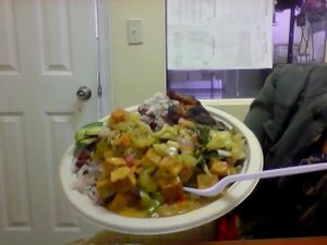 Curry tofu organic, rice and peas,collards& cabbage,plantain and avocado! at Island Pizzeria in Tacoma