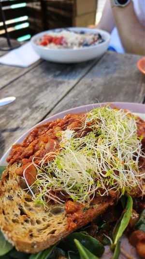 Baked beans on sourdough at Combi in Elwood