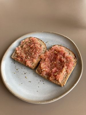Tomato bruschetta on warm brown bread with olive oil and oregano   at Café Melita - Palmelita in Tenerife