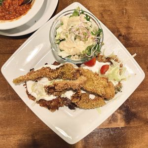 Potato latkes with fried mushrooms and cream sauce   at Vege Miasto in Warsaw