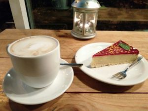 millet raspberry cake and cereal coffe with rice milk at Vege Miasto in Warsaw