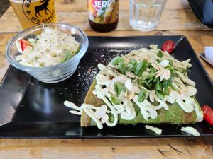 Spinach-based something (?) with vegan cashew-based ricotta and salad at Vege Miasto in Warsaw