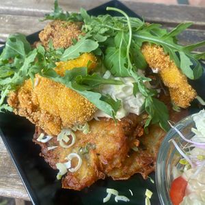 Oyster mushrooms (fried) on fried potato cakes  at Vege Miasto in Warsaw