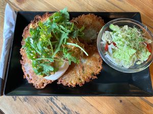 Potato pancakes with fried oyster mushrooms at Vege Miasto in Warsaw
